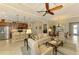Kitchen with stainless steel appliances, wood cabinets, and breakfast bar with seating at 13000 N Marsh Dr, Port Charlotte, FL 33953