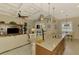 Open-concept kitchen and living space with a large island perfect for entertaining and casual dining at 13000 N Marsh Dr, Port Charlotte, FL 33953