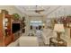 Open concept living area features a wall-mounted TV and water views at 13000 N Marsh Dr, Port Charlotte, FL 33953