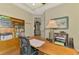 Home office featuring a desk, shelves, and easy access to other areas of the home at 13000 N Marsh Dr, Port Charlotte, FL 33953
