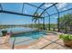Sparkling screened pool with tranquil lake views at 13000 N Marsh Dr, Port Charlotte, FL 33953