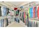 Spacious walk-in closet with built-in shelving and ample storage space for organization and convenience at 13000 N Marsh Dr, Port Charlotte, FL 33953