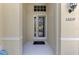 Front porch of home with decorative security door and house number visible at 13217 Scrub Jay Ct, Port Charlotte, FL 33953