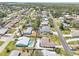 Aerial view of the property's location in a residential neighborhood, showing proximity to community amenities at 1365 Sussex Rd, Venice, FL 34293