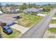 An aerial view showing the home's location, with a spacious driveway and well-kept landscaping at 1365 Sussex Rd, Venice, FL 34293