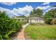 Exterior of a one story house with a walkway and a driveway at 1386 Dewitt St, Port Charlotte, FL 33952