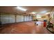 Large garage featuring multiple bays, providing ample space for vehicles and storage at 1386 Dewitt St, Port Charlotte, FL 33952