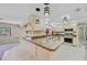 Spacious kitchen with stainless steel appliances, granite counters, and eat-in bar at 1386 Dewitt St, Port Charlotte, FL 33952
