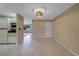 Clean and open kitchen and dining area featuring tile flooring and ample natural light at 1386 Dewitt St, Port Charlotte, FL 33952