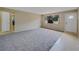 Spacious living room with neutral walls and large window for natural light at 1386 Dewitt St, Port Charlotte, FL 33952