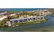 An aerial view of the waterfront condo community, showcasing boat access and waterfront views at 1401 S Mccall Rd # A 108, Englewood, FL 34223