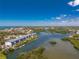 An aerial view of the condo community, showing the bay and waterfront access at 1401 S Mccall Rd # A 108, Englewood, FL 34223