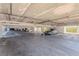 Indoor parking garage with dedicated spots for residents and their vehicles at 1401 S Mccall Rd # A 108, Englewood, FL 34223