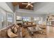 Large living room featuring a fireplace, vaulted ceiling, and lots of natural light at 17 Seawatch Dr, Boca Grande, FL 33921