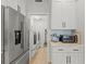 Walk-in pantry features stainless steel fridge and modern appliances at 17 Seawatch Dr, Boca Grande, FL 33921
