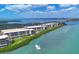 Coastal condominiums offer waterfront living and a community pool, close to the bay and local attractions at 1701 Beach Rd # 208, Englewood, FL 34223