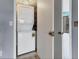 Efficient laundry area with stacked washer and dryer, maximizing space in the home at 1701 Beach Rd # 208, Englewood, FL 34223