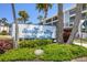 Sandpiper Key condominiums with lush landscaping located at 1701-1751 Beach Road at 1701 Beach Rd # 208, Englewood, FL 34223