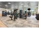 State-of-the-art fitness center with a variety of weight machines and large windows at 17645 Boracay Ct # 202, Venice, FL 34293