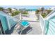 Relaxing balcony with beach views and comfortable lounge chair at 180 S Gulf Blvd, Placida, FL 33946