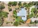 Aerial view of property with tropical landscaping and lush green backyard at 20 Spaniards Rd, Placida, FL 33946
