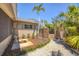Backyard area with well-manicured landscaping and a fountain detail at 20 Spaniards Rd, Placida, FL 33946