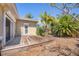 Back deck with adjacent landscaping at 20 Spaniards Rd, Placida, FL 33946