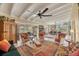 Bright living room featuring an open floorplan, ceiling fan and comfortable furniture with an outdoor view at 20 Spaniards Rd, Placida, FL 33946