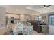 Open-concept living space combines kitchen, dining, and living areas for seamless flow at 2117 Laurifolia Ct, North Port, FL 34289