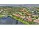 Beautiful aerial shot highlighting the neighborhood layout with serene lakes and lush green spaces at 2669 Wax Myrtle Ct, Port Charlotte, FL 33953