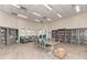 Community library with bookshelves, large table and comfortable chairs for residents' enjoyment at 2669 Wax Myrtle Ct, Port Charlotte, FL 33953