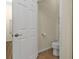 Neutral-toned powder room featuring a toilet and tile flooring at 2669 Wax Myrtle Ct, Port Charlotte, FL 33953