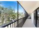 This condo features a screened in balcony with beautiful, lush tropical views at 2769 N Beach Rd # 105, Englewood, FL 34223