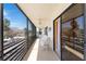 A screened balcony with seating gives ample outdoor space at 2769 N Beach Rd # 105, Englewood, FL 34223