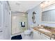 This bathroom features neutral walls and a granite vanity at 2769 N Beach Rd # 105, Englewood, FL 34223