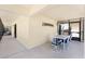 Spacious screened lanai with comfortable seating at 2769 N Beach Rd # 105, Englewood, FL 34223