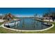 Waterfront property with private boat slips, providing easy access to the open water for boating and fishing at 2769 N Beach Rd # 105, Englewood, FL 34223