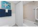 Bathroom with shower/tub and coastal themed accessories at 2955 N Beach Rd # D113, Englewood, FL 34223