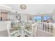 Cozy dining area complemented by water views, enhancing the dining experience with a serene backdrop at 2955 N Beach Rd # D113, Englewood, FL 34223
