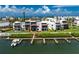 Waterfront condo features a private patio overlooking the channel, offering scenic views and convenient boat access at 2955 N Beach Rd # D113, Englewood, FL 34223