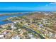Waterfront home boasts direct gulf access and views of Lemon Bay, nestled in a vibrant coastal community at 30 Buccaneer Bnd, Placida, FL 33946