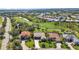 Beautiful aerial view of homes on a golf course, complete with lush greenery and serene water features at 3511 Bay Ridge Way, Port Charlotte, FL 33953