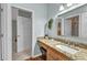 Bathroom vanity with granite counters, undermount sink, decorative accents and natural lighting at 3511 Bay Ridge Way, Port Charlotte, FL 33953