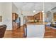 Charming kitchen with granite countertops, stainless steel appliances, and an island for extra seating at 3511 Bay Ridge Way, Port Charlotte, FL 33953