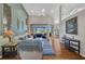 Spacious living room with vaulted ceilings, hardwood floors, and bright natural light at 3511 Bay Ridge Way, Port Charlotte, FL 33953
