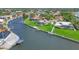 Waterfront homes boast private docks on a scenic canal, enhancing the community's appeal for boaters and water enthusiasts at 44 Waterford Dr, Englewood, FL 34223