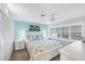 Inviting bedroom featuring a plush bed, ample closet space, and lots of natural light at 44 Waterford Dr, Englewood, FL 34223