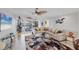 Spacious living area featuring plush seating, modern decor, and natural light, perfect for entertaining and relaxation at 44 Waterford Dr, Englewood, FL 34223