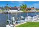 Waterfront features a private dock, perfect for boating and enjoying waterfront living at 44 Waterford Dr, Englewood, FL 34223