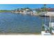 Amazing waterfront views with a private dock, offering a fantastic opportunity for boating enthusiasts at 44 Waterford Dr, Englewood, FL 34223